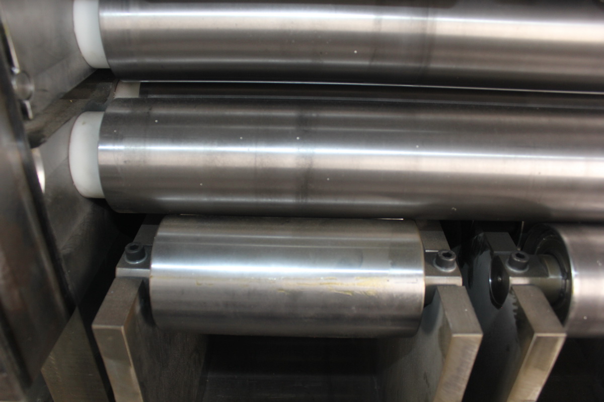 Close-up View of Leveling Machine Support Rollers